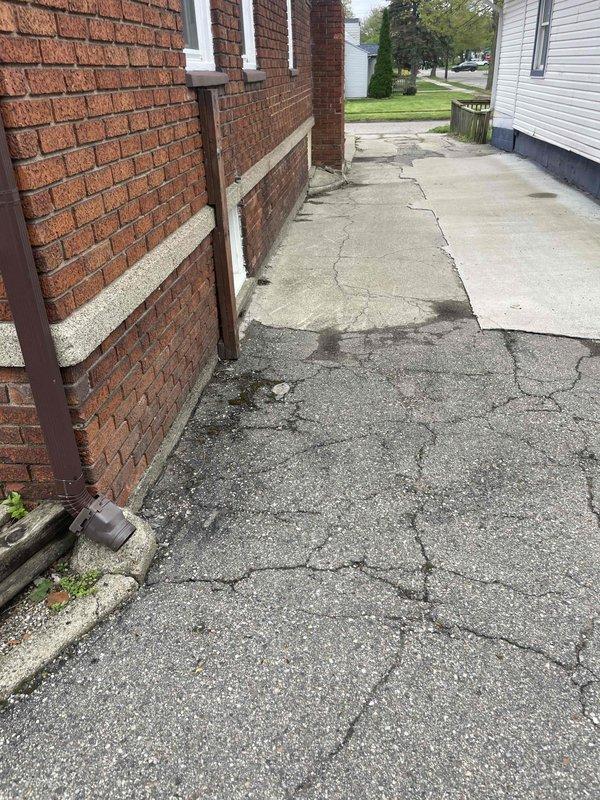 Conducted comprehensive site assessment for furnace and air conditioning system replacement in basement location of residential property. Evaluated existing equipment dating back to 1926, confirmed current unit operational but recommended full system replacement due to age and efficiency concerns. Documented exterior access points and building structure for equipment installation planning.