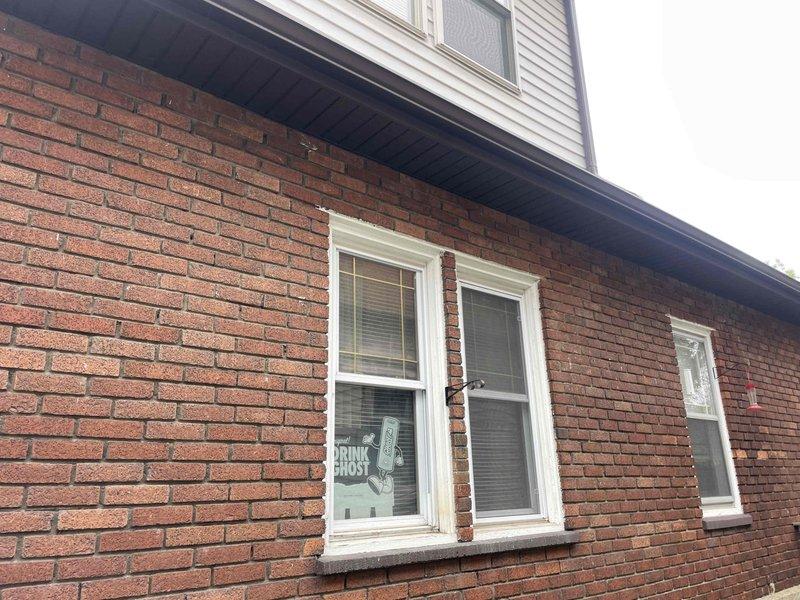 Conducted comprehensive site assessment for furnace and air conditioning system replacement in basement location of residential property. Evaluated existing equipment dating back to 1926, confirmed current unit operational but recommended full system replacement due to age and efficiency concerns. Documented exterior access points and building structure for equipment installation planning.