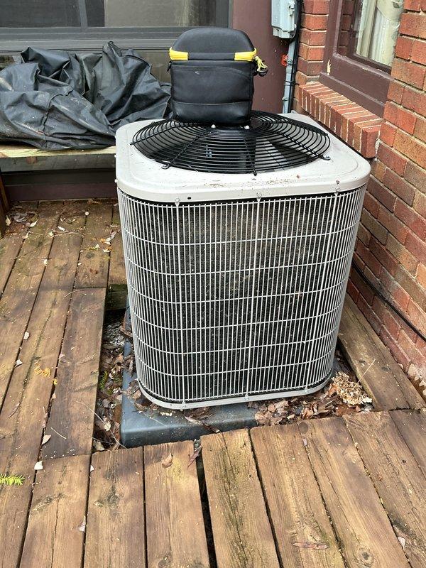 Completed comprehensive tune-up on outdoor air conditioning unit over 10 years old located on exterior wooden deck adjacent to brick structure. Performed full system inspection including access to electrical components, verified proper operation of capacitor and contactor with all wire connections secure, and confirmed unit functionality. System cleaned and serviced per manufacturer specifications with all components operating within normal parameters at time of service completion.