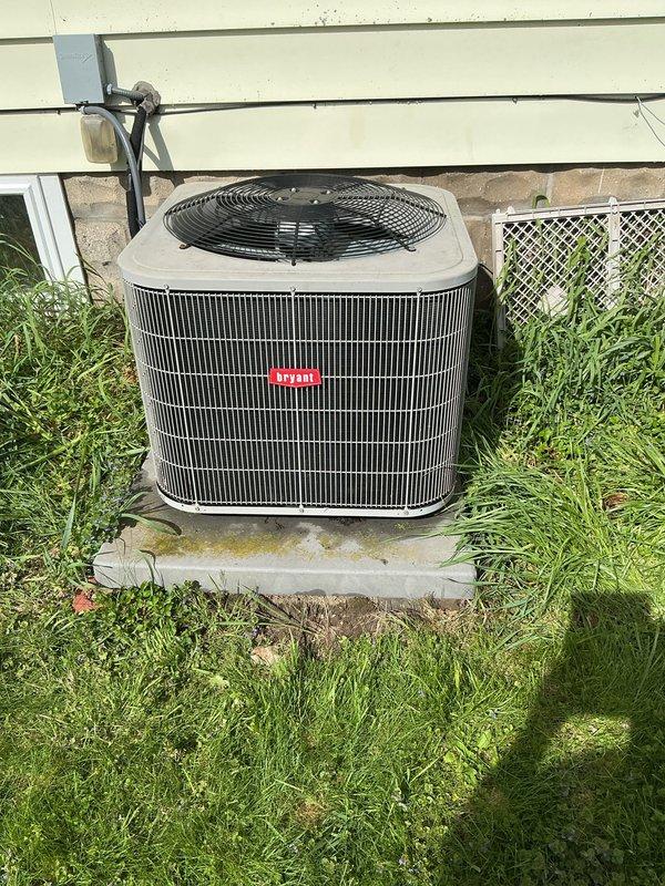 Completed annual cooling maintenance on Bryant condenser unit. Inspected system components, replaced air filter, and cleaned evaporator pad as part of routine preventative maintenance service.