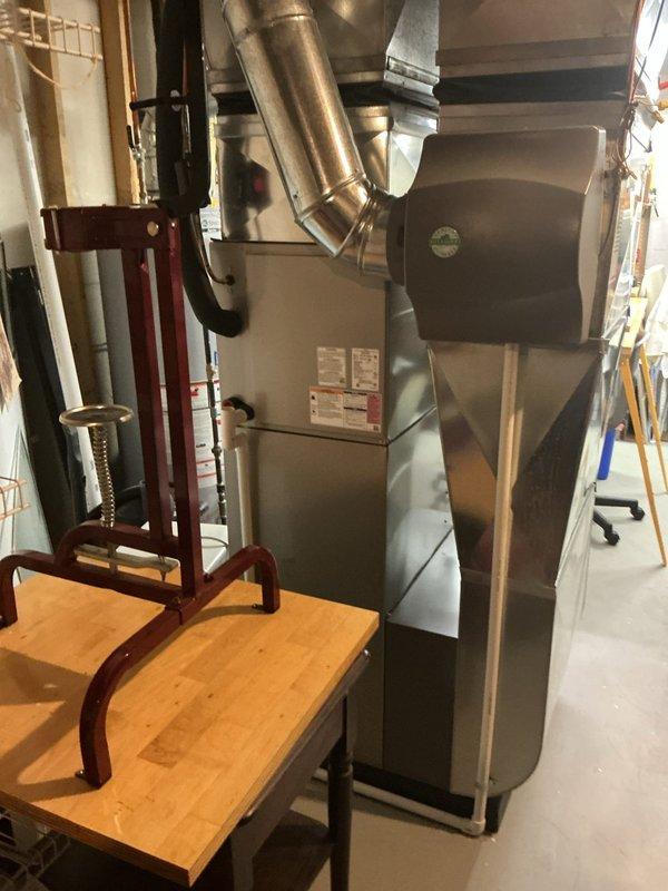 Completed annual cooling maintenance on residential HVAC system. Removed top access panel and performed comprehensive inspection of air handler unit and evaporator coil assembly. Verified refrigerant lines and insulation integrity on all white-insulated suction and liquid lines. Inspected heat exchanger fins and coil surfaces for cleanliness and proper condition. Checked control board and electrical connections for proper operation. Verified condensate drain lines and PVC drainage system are clear and functioning correctly. Inspected blower housing and ductwork connections at plenum. All components operating within normal parameters with no deficiencies noted.