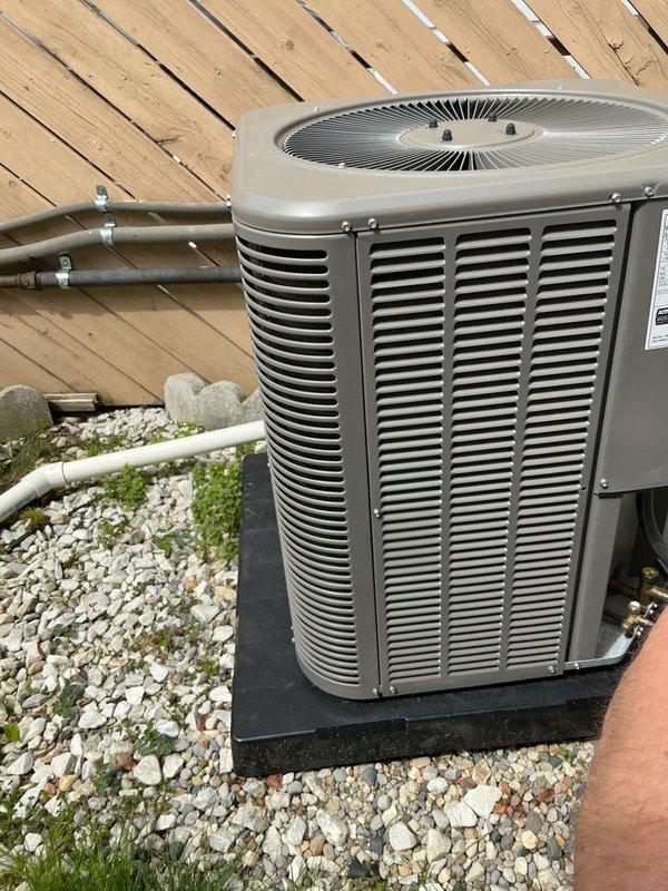 Completed annual cooling maintenance on residential air conditioning system. Inspected outdoor condenser unit, verified proper operation of compressor and condenser fan motor, checked refrigerant lines and insulation integrity, and confirmed unit is level on pad with adequate clearance. Cleaned condenser coils, checked electrical connections, and verified system is operating within manufacturer specifications.