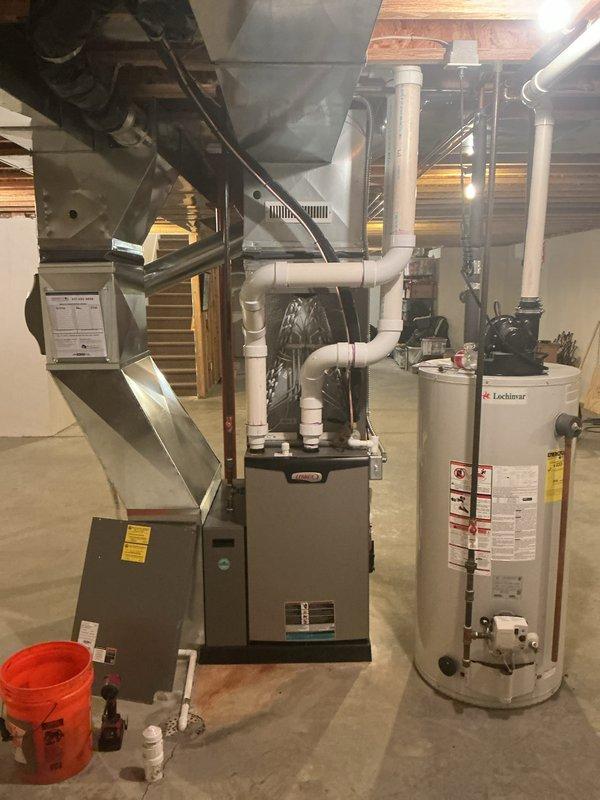 Completed annual cooling maintenance on residential HVAC system. Performed comprehensive inspection of evaporator coil, A-frame assembly, refrigerant lines, and all associated PVC drainage piping. Verified proper operation of furnace, air handler, and integrated mechanical systems in basement installation.
