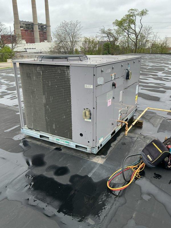 Performed scheduled maintenance on four rooftop units at commercial facility, including filter replacements (12 filters at 20x20x2 and 4 filters at 16x20x2 specifications) and belt replacements on blower assemblies. Inspected all RTU components, checked refrigerant pressures with manifold gauges, verified motor operation and pulley alignment, and documented equipment condition with photos. Prepared equipment replacement quote for aging RTU units as requested due to wear and operational efficiency concerns.