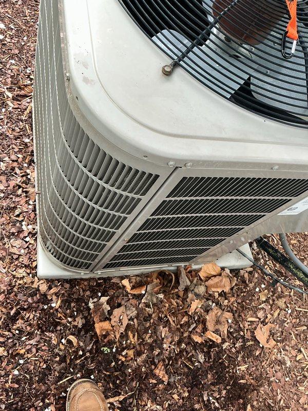 Completed annual cooling maintenance on residential HVAC system. Performed comprehensive inspection of outdoor condenser unit, checking electrical components and measuring capacitor reading of 9.6 MFD using digital multimeter. Replaced air filter and conducted hot water tank inspection as part of scheduled preventive maintenance service.