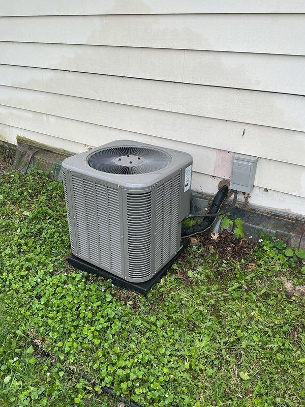 Completed annual preventive maintenance on residential split-system air conditioning unit. Performed comprehensive inspection of outdoor condenser unit, verified proper operation of compressor and fan motor, cleaned condenser coils, checked refrigerant levels, and tested electrical connections. Unit operating within normal parameters with no deficiencies noted.