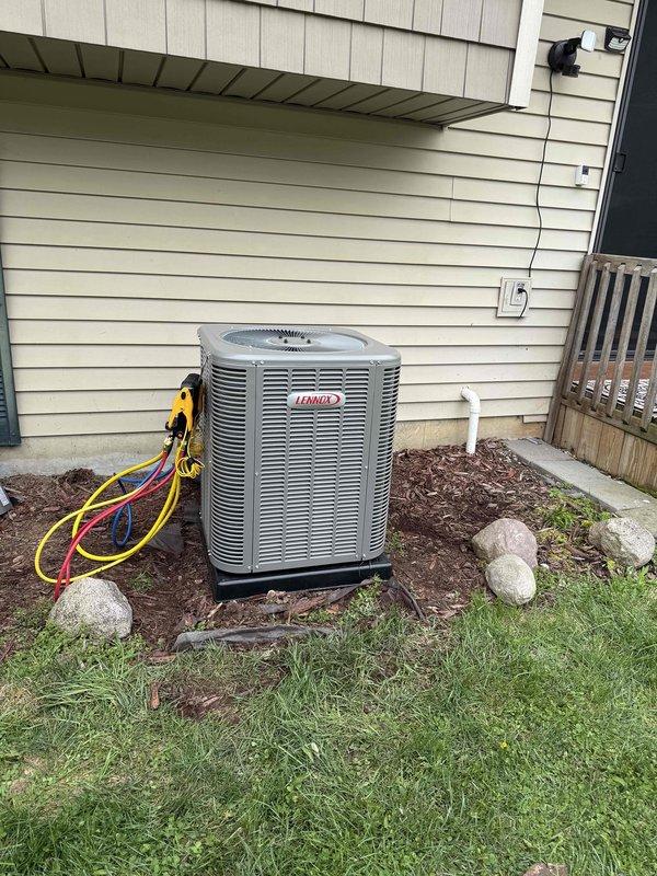 Completed full HVAC system installation including a Lennox 90,000 BTU gas furnace and 2-ton air conditioning unit. Installed furnace in basement mechanical room with proper venting, gas line connection, electrical conduit, and PVC condensate drainage; mounted outdoor Lennox condenser unit on equipment pad with refrigerant line connections and electrical service. System was pressure tested, refrigerant lines were charged, all connections were verified for proper operation, and unit was commissioned to manufacturer specifications.