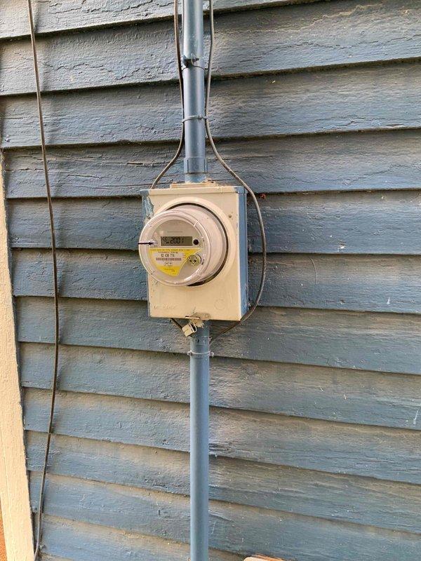 Completed estimate for replacement of 7-year-old natural gas furnace and air conditioning system located in basement with stone foundation walls. Current equipment is operational but customer seeking replacement options for direct venting configuration. Evaluated existing HVAC installation including white vertical air handler unit, flexible gray ductwork, metallic branch ducts, and copper refrigerant lines in residential mechanical room setting.