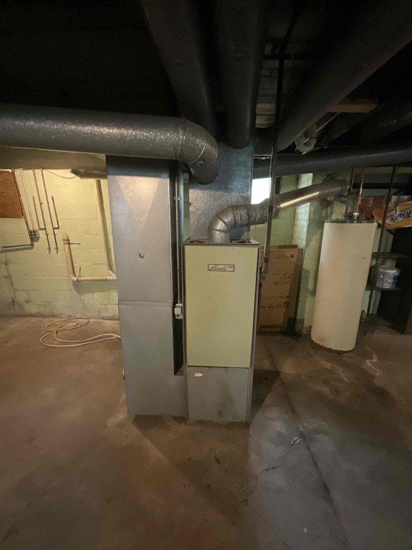 Conducted on-site assessment for furnace replacement estimate. Inspected existing 50-year-old heating system in basement, documented current equipment condition and ductwork configuration. Evaluated installation requirements for new furnace system and discussed promotional air conditioning options with homeowner for future consideration.