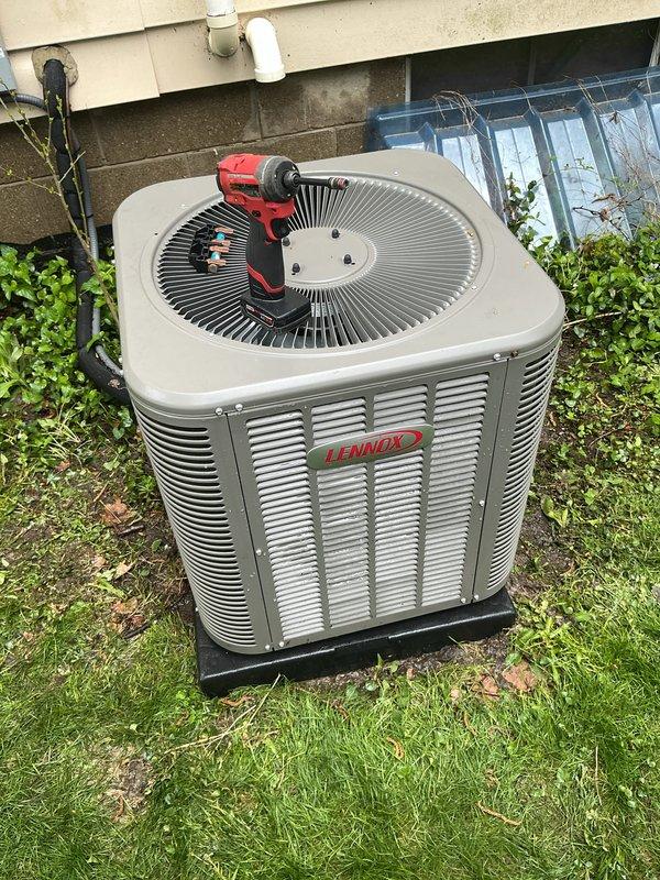 Completed annual cooling maintenance on Lennox outdoor condensing unit. Performed comprehensive system inspection, changed air filter and evaporator pad, cleaned condenser coils, and verified proper operation of all components with unit cycling normally upon completion.