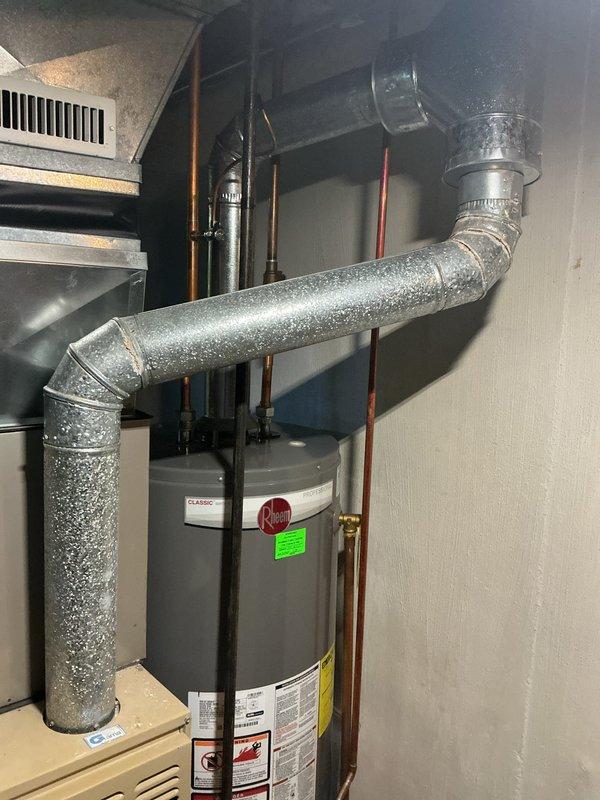Responded to no-heat call on 22-year-old forced air furnace. Upon arrival, confirmed unit would not initiate heating cycle when thermostat was raised. Removed front access panel and performed diagnostic inspection of internal components including blower motor, electrical connections, and control board. Identified failed ignition system preventing burner operation. Due to age of equipment and availability of replacement parts for this legacy system, advised homeowner of repair options and recommended evaluation of full system replacement given unit has exceeded typical service life expectancy. Documented equipment condition with photographs showing internal components and overall installation. Unit remains non-operational pending homeowner decision on repair versus replacement.