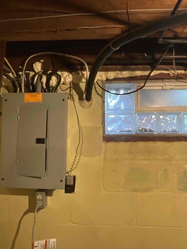 Conducted estimate for air conditioning system replacement on 28-year-old residential HVAC unit in preparation for upcoming summer season. Inspected existing basement-installed equipment including furnace, associated ductwork, and electrical infrastructure to assess compatibility requirements for new AC installation. Documented current system configuration and utility room layout with photographic records to support replacement proposal specifications.