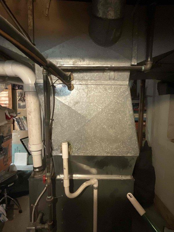 Provided comprehensive estimate for air conditioning system replacement in basement location. Current AC unit from 1987 remains operational but has exceeded expected service life. Evaluated existing installation including air handler, ductwork configuration, condensate drainage system, and electrical connections to determine proper replacement specifications and equipment sizing requirements for new high-efficiency cooling system.