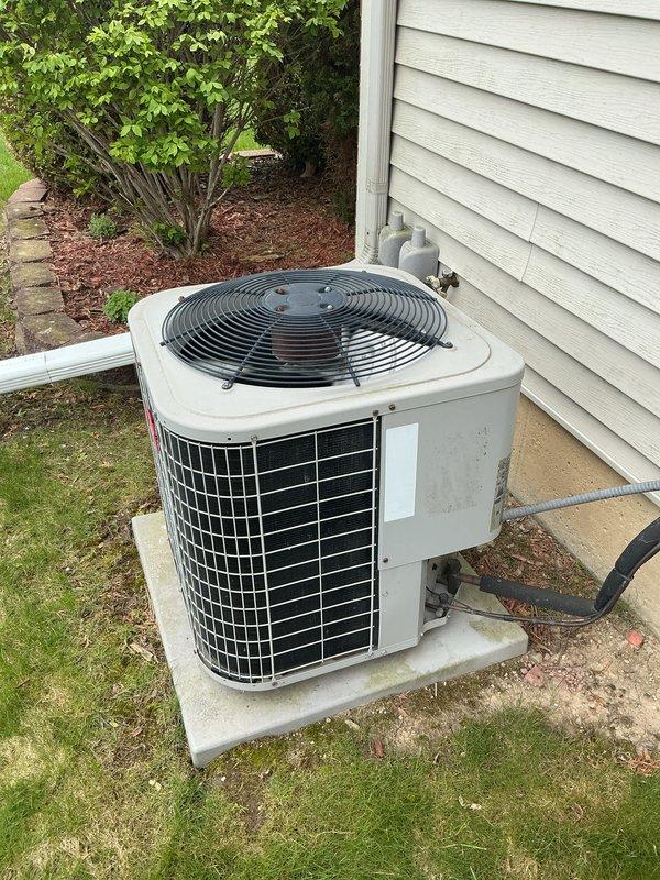 Completed annual cooling maintenance on residential air conditioning system. Performed comprehensive inspection of outdoor condenser unit, verified operational status of all components including compressor, fan motor, and electrical connections. Cleaned condenser coils, checked refrigerant lines and electrical conduit connections, and confirmed unit is operating within normal parameters for the upcoming cooling season.