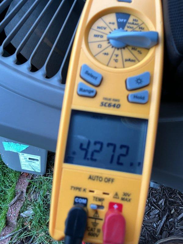 Completed annual cooling maintenance on ACM unit. Performed comprehensive system inspection, tested electrical components and recorded amperage readings using clamp meter, verified capacitor values with multimeter showing 42.72 MFD reading. All measurements within manufacturer specifications, unit operating properly with no deficiencies noted.