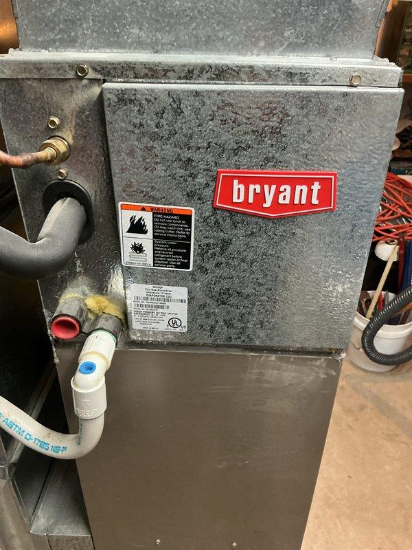 Completed annual cooling maintenance on Bryant furnace system. Inspected unit, which showed normal dust accumulation from regular operation. Evaluated existing Glasfloss air filter with pleated media and cardboard frame for condition and replacement needs. Checked condensate drainage lines, refrigerant connections, and ductwork connections for proper operation. System operational and ready for cooling season.