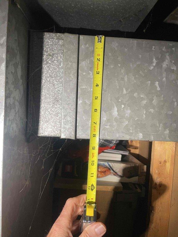 Responded to no-heat complaint on ancient furnace system located in basement. Performed full system assessment and measurements of existing HVAC equipment, including HSL furnace unit, galvanized plenum, ductwork, and evaporator coil. Provided comprehensive quote for complete system replacement, documenting equipment dimensions and configuration for proper sizing of new installation.