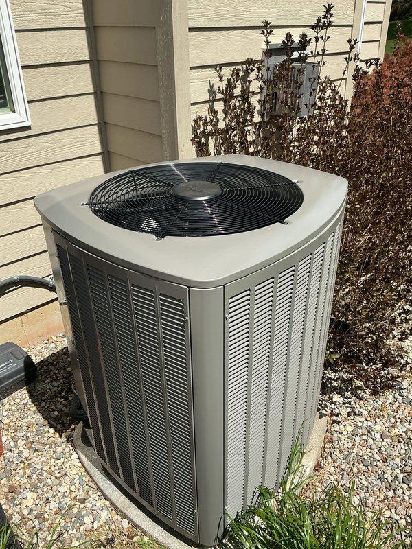 Completed annual AC tune-up and maintenance on 1-year-old Lennox system. Performed comprehensive inspection of outdoor condenser unit, verified proper operation of all components, and inspected indoor air handler with blower assembly and filtration system. System operating properly with no issues identified; all components functioning within normal parameters.