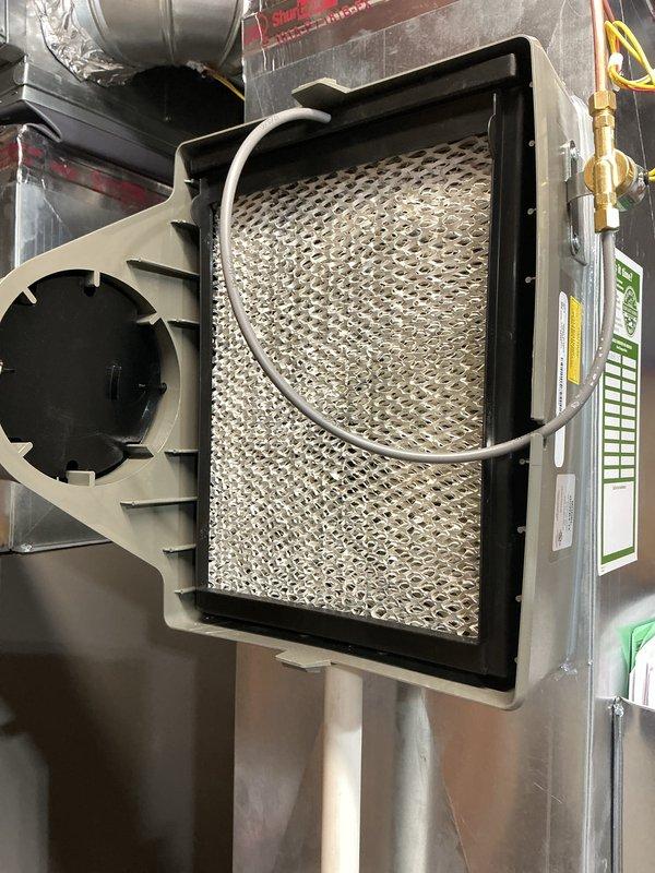 Completed annual AC tune-up and maintenance on 1-year-old Lennox system. Performed comprehensive inspection of outdoor condenser unit, verified proper operation of all components, and inspected indoor air handler with blower assembly and filtration system. System operating properly with no issues identified; all components functioning within normal parameters.
