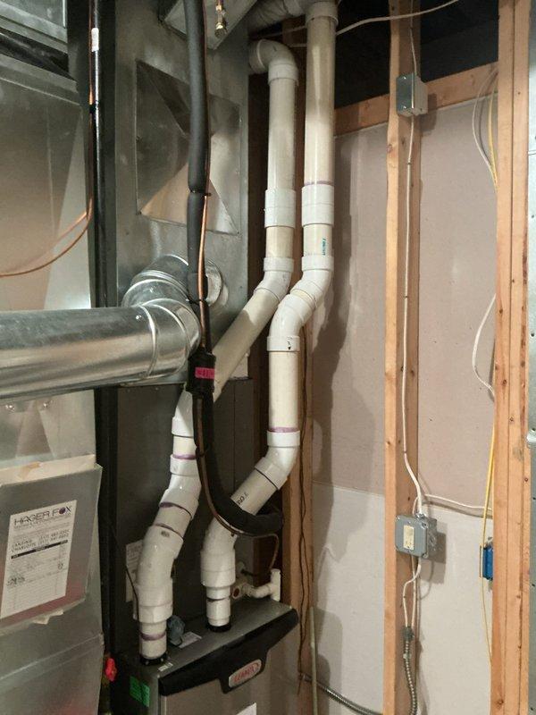 Responded to callback for 6-year-old furnace in basement experiencing no heat condition with error codes 240 (GF Low Flame Current - Run Mode) and 273 (GF Flame Fail In Run Mode). Upon arrival, system showed minimal airflow and multiple fault codes indicating flame sensing issues and excessive restart attempts. Inspected flame sensor, ignition system, and gas valve operation. Cleaned flame sensor rod to remove carbon buildup affecting flame current signal. Verified proper gas pressure at manifold and checked for adequate combustion air supply. Tested ignition sequence and confirmed flame establishment with proper microamp reading. Cleared fault codes from control board and cycled system through multiple heating cycles to verify stable operation. System now heating properly with no error codes present. Covered under parts warranty.