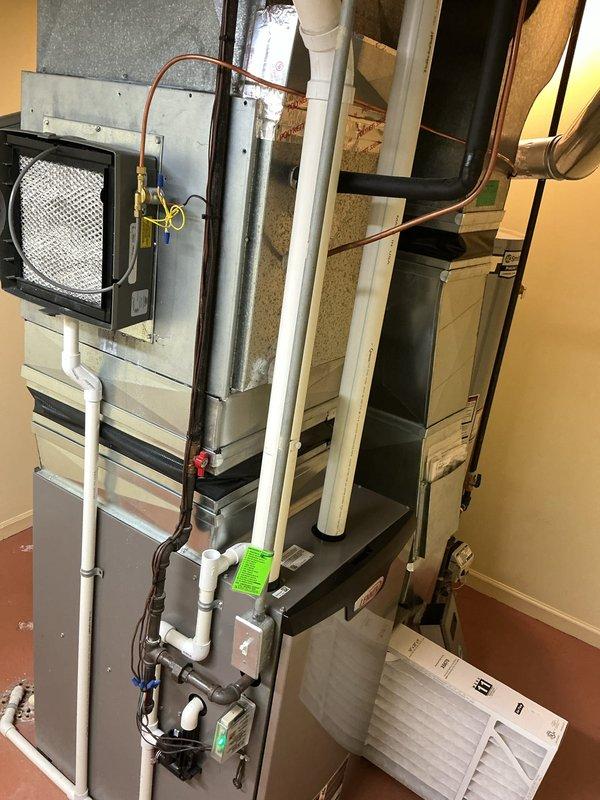Completed annual cooling maintenance on residential HVAC system. Replaced air filter and evaporator pad on air handler unit, inspected all accessible components including ductwork connections, condensate drain lines, and refrigerant lines for proper operation. System tested and found operating within normal parameters with no issues identified.