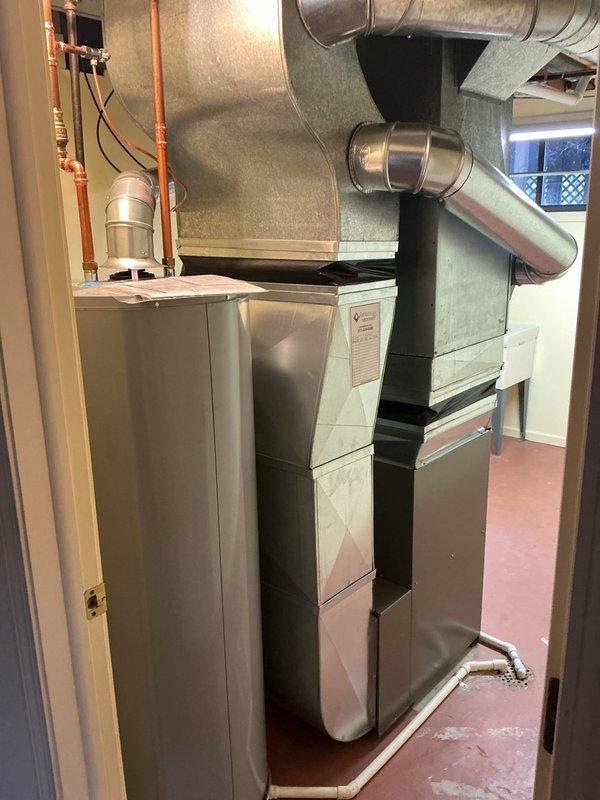 Completed annual cooling maintenance on residential HVAC system. Replaced air filter and evaporator pad on air handler unit, inspected all accessible components including ductwork connections, condensate drain lines, and refrigerant lines for proper operation. System tested and found operating within normal parameters with no issues identified.