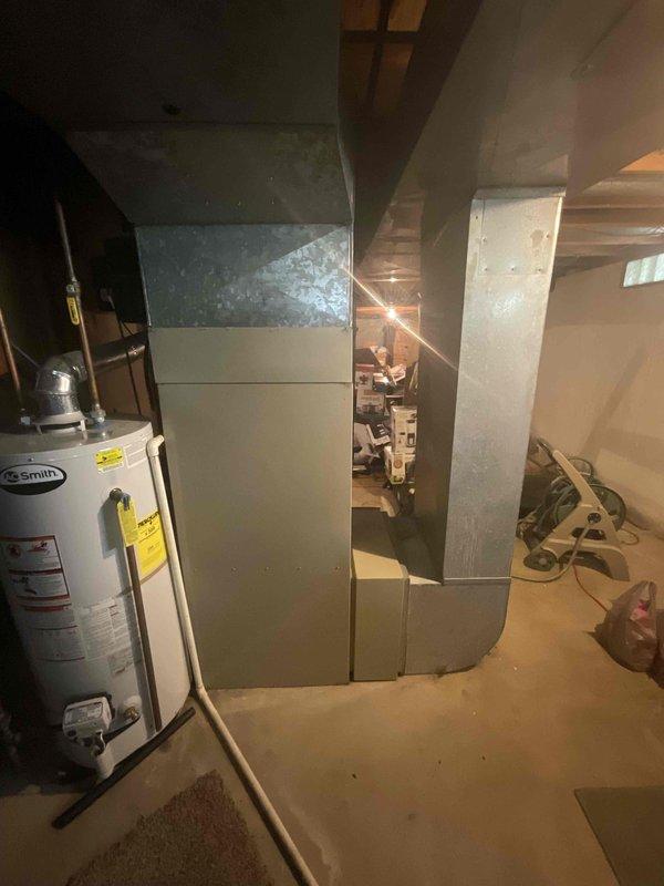 Provided estimate for complete furnace and air conditioning system replacement in basement mechanical room. Existing equipment is aged and operational but requires replacement. Assessed current HVAC installation including ductwork configuration, equipment accessibility, and mechanical room layout for proper sizing and installation planning of new heating and cooling systems.