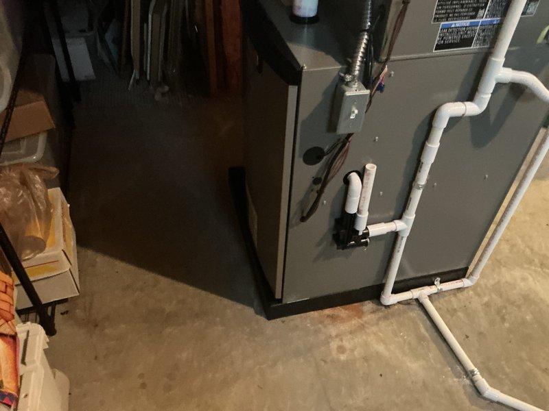 Completed full HVAC system installation in residential basement, including 90,000 BTU furnace with integrated humidifier and 3.5-ton air conditioning unit configured for right-side placement. Installed all necessary ductwork connections, PVC venting with proper pitch and support, electrical conduit, and condensate drainage lines. Reconnected existing electrical circuits, verified proper airflow distribution, and tested all system functions to ensure optimal performance and safety compliance.
