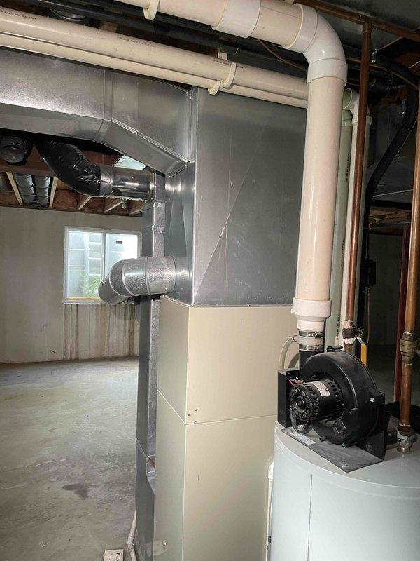 Conducted on-site assessment for complete HVAC system replacement at residential property. Evaluated non-operational furnace located in basement and existing outdoor air conditioning unit. Documented current equipment configuration including ductwork connections, PVC condensate drainage, refrigerant line routing, and concrete pad placement for outdoor condenser. Coordinated access with tenant and provided comprehensive replacement options to homeowner via phone consultation for aging failed heating system.