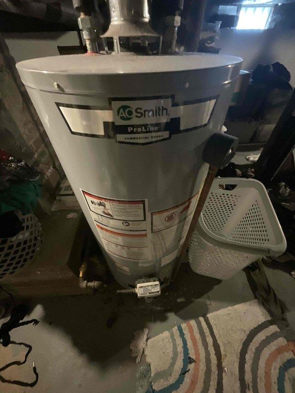 Provided estimate for complete furnace and air conditioning system replacement in basement location. Existing 29-year-old equipment currently operational but has exceeded expected service life. Assessed installation area including ductwork configuration, electrical connections, and clearance requirements for new high-efficiency equipment.