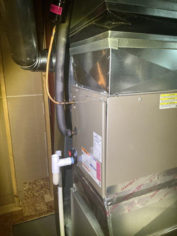 Completed annual cooling maintenance on Lennox HVAC system. Performed comprehensive inspection of furnace unit, ductwork connections, and associated components including water heater piping and PVC condensate lines. Replaced air filter and verified all system connections, manufacturer labels, and safety compliance stickers were intact and properly displayed.