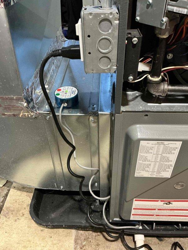 Responded to no-heat call on 3-year-old Energy Elite Series furnace displaying red indicator light. Upon arrival, found furnace in safety lockout mode due to moisture exposure from adjacent water softener leak. Inspected unit for water damage and verified no internal moisture penetration into critical components. Checked condensate drain system, blower assembly, and electrical connections for water intrusion. Confirmed furnace control board triggered safety shutdown as designed to prevent electrical damage. Allowed unit adequate drying time and verified all safety sensors functioning properly. Reset furnace control system and cycled unit through complete heating sequence. Confirmed proper ignition, flame sensing, and blower operation with no fault codes present. Verified adequate airflow through supply and return ductwork. Advised homeowner that furnace safety systems operated correctly and unit sustained no permanent damage from moisture event. Recommended monitoring area for addition