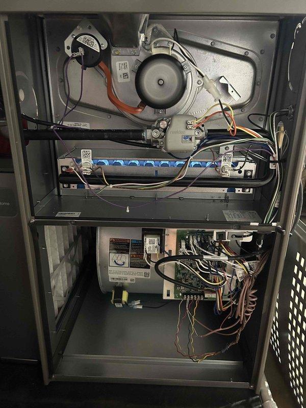 Responded to no heat call on recently installed HVAC system. Upon arrival, inspected thermostat operation and verified settings, then accessed unit interior to examine blower motor assembly, wiring connections, and control board for proper installation and functionality. Documented system components and configuration with photos for warranty and quality assurance purposes.