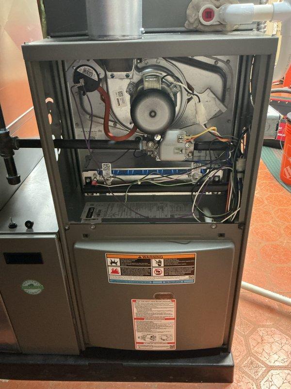 Completed scheduled maintenance on residential air handling system, including inspection of gas furnace interior components, blower motor assembly, and electrical connections. Performed outdoor condensing unit inspection, verifying proper operation of all components and documenting equipment condition with photographic records.