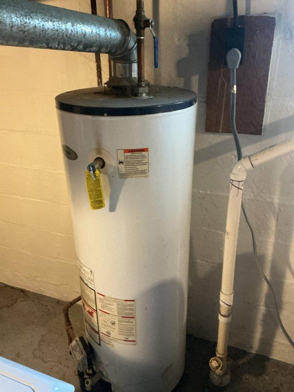 Responded to a no-heat call on a tanked water heater that would not ignite or maintain flame. Upon arrival, inspected the unit located in the basement utility area and assessed the pilot assembly and gas control valve operation. Determined the water heater was experiencing pilot failure due to a faulty thermocouple or gas control valve malfunction. Performed diagnostic testing on the ignition system and confirmed the unit was unable to maintain a standing pilot flame, resulting in complete loss of hot water production.