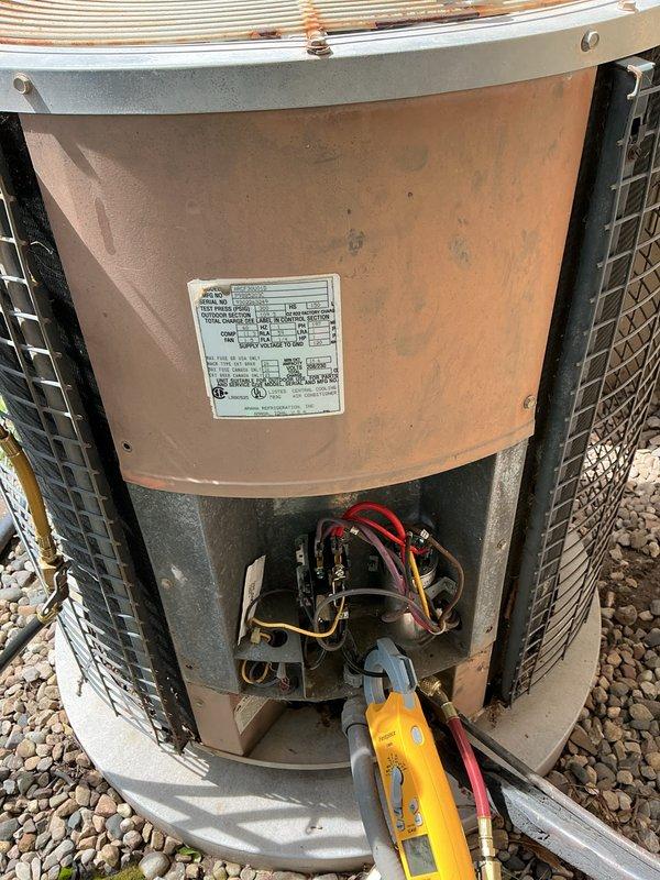 Completed annual preventative maintenance on residential air conditioning system. Performed comprehensive system inspection including electrical diagnostics with multimeter testing of contactors and connections, refrigerant pressure readings using manifold gauges to verify proper system charge, and filter replacement. All electrical components tested within normal operating parameters, refrigerant pressures confirmed at manufacturer specifications, and unit found to be operating efficiently with no deficiencies noted.