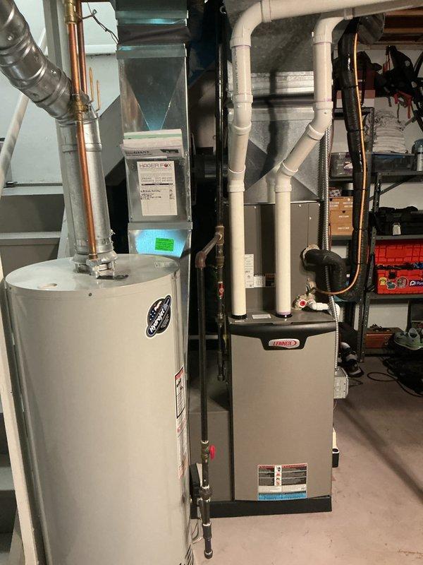 Completed annual preventative maintenance on residential HVAC system including Lennox furnace and air handler unit. Inspected all mechanical components, verified proper operation of heating equipment, examined water heater connections and copper piping for leaks, checked PVC vent pipes for proper installation and clearances, replaced air filter, and confirmed system functionality. All equipment found operating within normal parameters with no deficiencies noted.