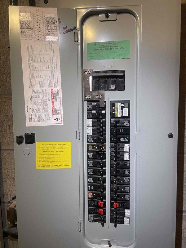 Conducted comprehensive estimate assessment for complete HVAC system replacement involving 28-year-old furnace and air conditioning unit, both original to the home and at end of serviceable life. Documented existing equipment configuration including air handler with diamond-pattern embossed metal panel, black flexible ductwork, refrigerant line routing, and electrical panel specifications showing main breaker configuration and circuit distribution. Photographed mechanical room layout, equipment positioning between wooden framing and concrete block wall, utility space constraints, and existing electrical infrastructure to provide accurate replacement recommendations for coordinated furnace and AC system upgrade.