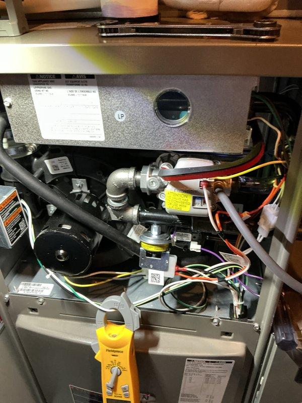 Completed complimentary recurring heating and cooling maintenance on AHC unit. Performed comprehensive system inspection with access panels removed, verified all electrical connections and wiring integrity, tested operational components including blower motor and controls, and utilized diagnostic instrumentation to confirm proper system performance. Replaced humidifier pad and furnace filter as scheduled maintenance items, documented equipment condition with photos showing internal components and testing procedures.