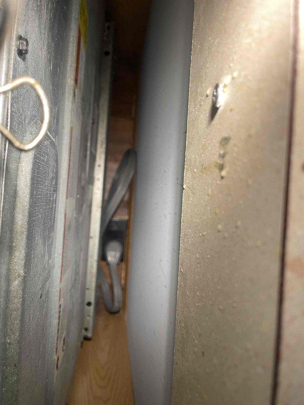 Conducted on-site evaluation for Generac generator installation at a 30-year-old residential property. Assessed existing electrical infrastructure, including main service panel accessibility and available capacity for generator integration. Documented current utility room configuration, photographing water heater, HVAC equipment placement, and available wall cavity space for potential electrical conduit routing to determine optimal generator placement and transfer switch installation location.