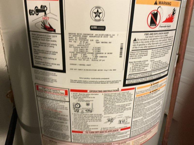 Successfully installed a new tanked water heater unit, model RG240S6N, ensuring all connections were properly secured and the system was fully operational. The installation included connecting copper supply lines, verifying all safety labels and specifications were intact, and confirming proper venting and clearances per manufacturer requirements. Unit was tested and left in excellent working condition with all safety warnings clearly visible.