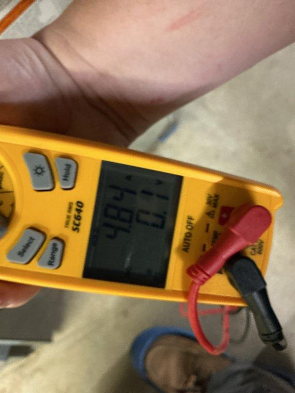 Completed promotional maintenance tune-up on HVAC system. Performed electrical diagnostics using digital multimeter, testing voltage and capacitance readings at outdoor condensing unit to verify proper system operation and component functionality. All measurements within normal operating parameters.