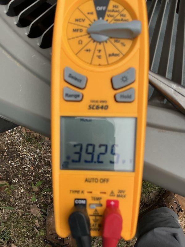 Completed promotional maintenance tune-up on HVAC system. Performed electrical diagnostics using digital multimeter, testing voltage and capacitance readings at outdoor condensing unit to verify proper system operation and component functionality. All measurements within normal operating parameters.