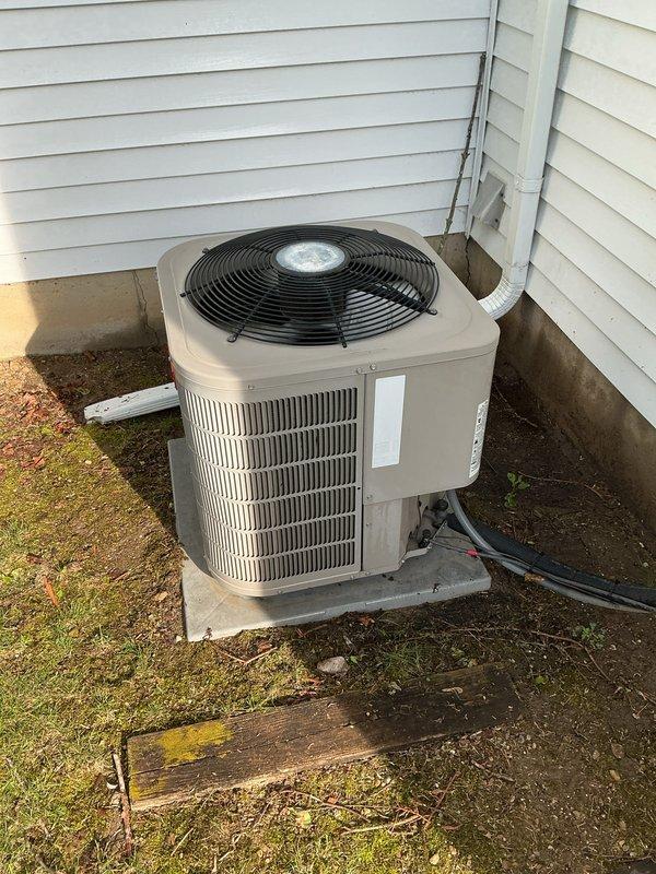 Completed annual preventive maintenance on Bryant residential air conditioning system. Performed comprehensive inspection of outdoor condenser unit including cleaning of coils, verification of refrigerant levels, testing of electrical components, and confirmation of proper fan operation. Unit found to be in normal operational condition with all systems functioning within manufacturer specifications.