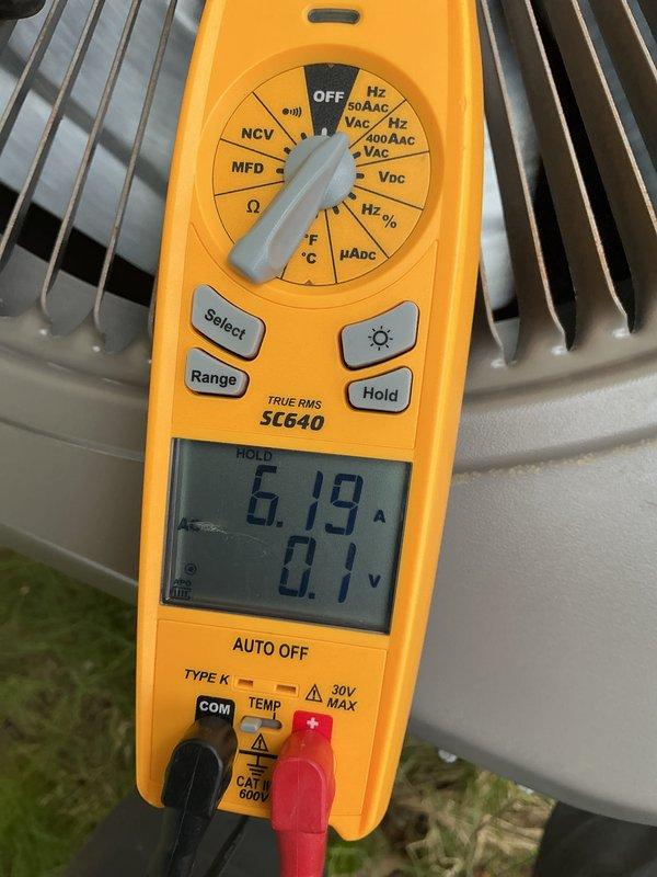 Completed annual HVAC maintenance on outdoor condensing unit. Performed electrical diagnostics using digital multimeter, measuring amperage draw at 6.19A and voltage readings, confirming system operating within normal parameters. Verified compressor performance with additional amperage reading of 456.7A during startup conditions. Inspected condenser coil fins and overall unit condition. Replaced air filter as scheduled maintenance item. Unit tested and left in proper working order for continued cooling season operation.