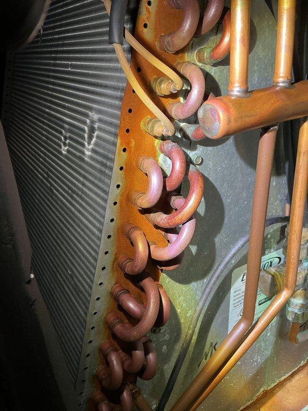 Completed annual cooling maintenance on Lennox HVAC system. Inspected heat exchanger coil, refrigerant lines, and copper piping assembly for proper operation and signs of wear. Replaced air filter and verified all system components functioning within normal parameters.
