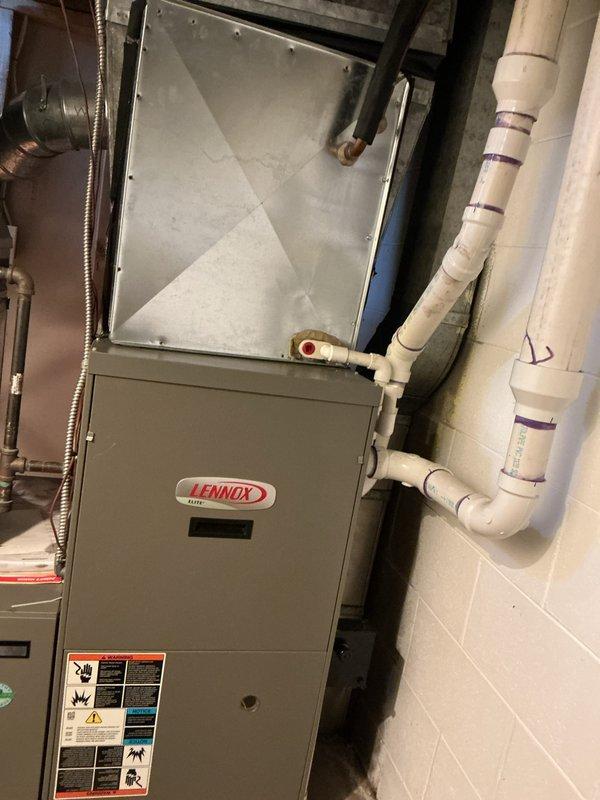 Completed annual cooling maintenance on Lennox HVAC system. Inspected heat exchanger coil, refrigerant lines, and copper piping assembly for proper operation and signs of wear. Replaced air filter and verified all system components functioning within normal parameters.