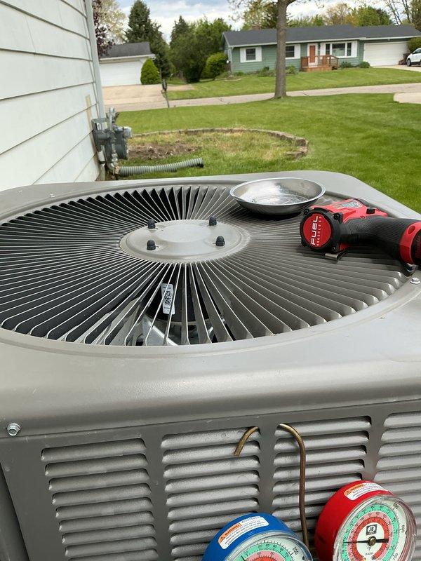 Completed annual air conditioning maintenance inspection on residential split system. Performed comprehensive 10-point inspection of both indoor air handler and outdoor condensing unit, documenting equipment condition with detailed photography. Verified proper operation of blower assembly, checked refrigerant pressures, inspected electrical connections and wiring, and confirmed all system components are functioning within normal parameters.
