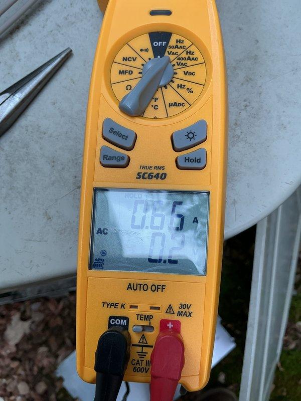 Performed scheduled maintenance on air conditioning unit. Conducted electrical diagnostics using digital multimeter to verify proper amperage draw and system performance. All measurements recorded within normal operating parameters, unit operating efficiently.