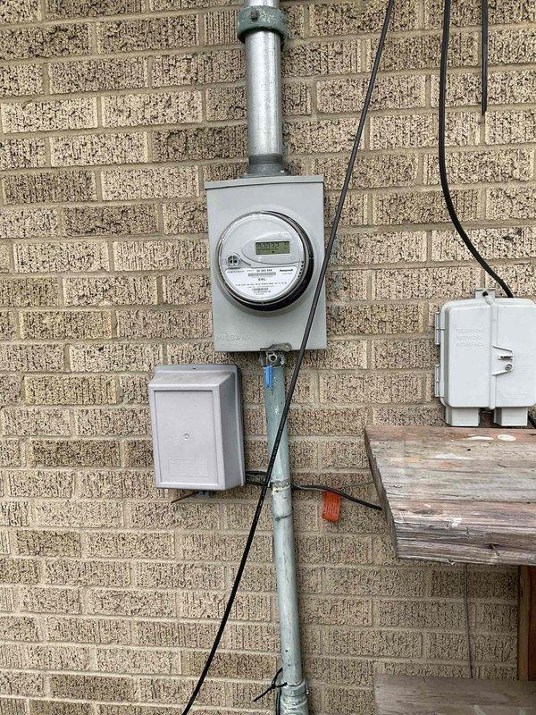 Provided estimate for replacement of 8-year-old non-operational natural gas furnace and air conditioning system located in basement under buy-one-get-one promotion. Assessed existing electrical service entrance, utility meter installation, and basement electrical panel with multiple circuit breakers to verify adequate power supply and proper grounding for new HVAC equipment installation.
